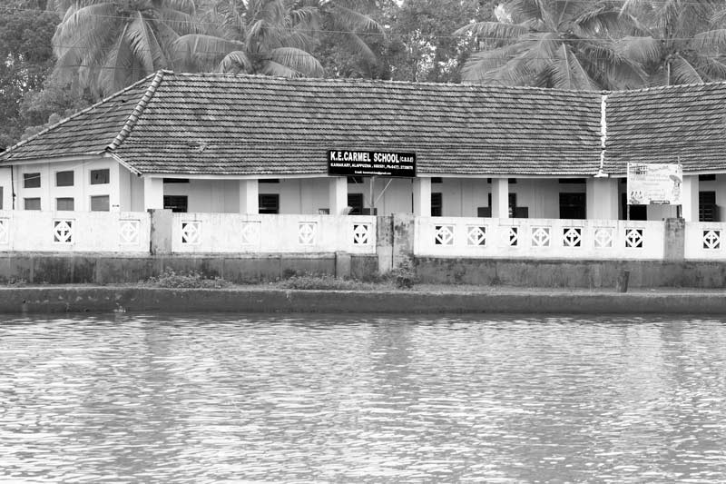 Living Below the Sea Level - school located next to an embankment in Alappuzha district, Kerala